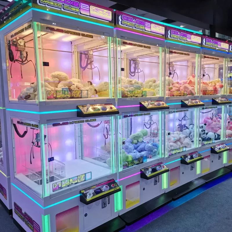 Commercial claw machines installed in a modern shopping mall entertainment area