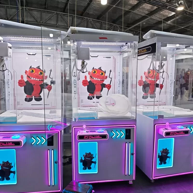Arcade machine payment system options including coin, bill, card, and QR