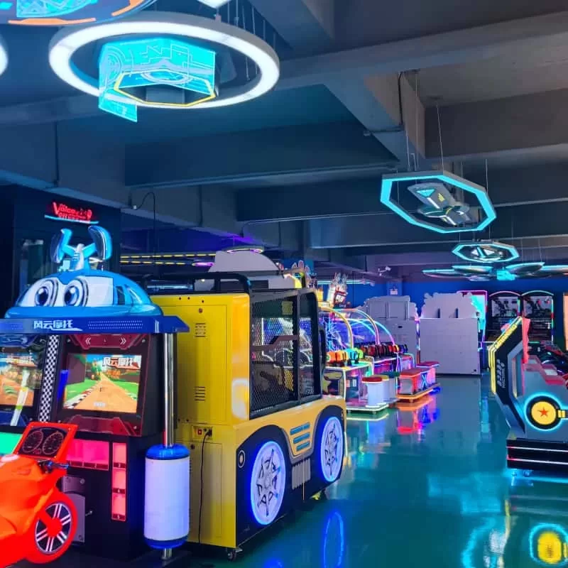 Arcade staff collecting cash from a commercial claw machine